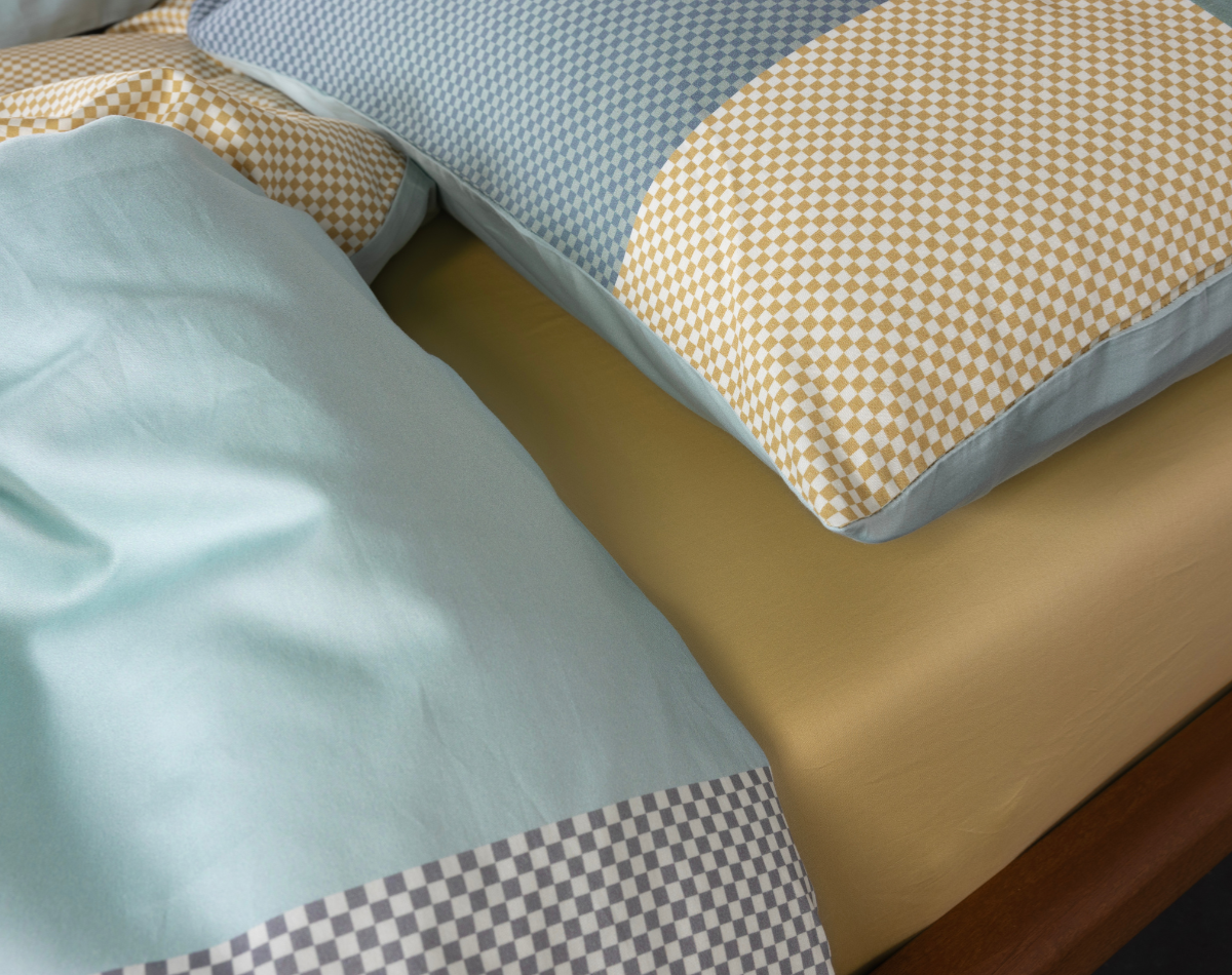 Welke maat hoeslaken past bij mijn bed?